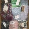 The photo shows a package with clothing in the category AP.