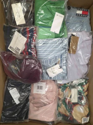 The photo shows a package with clothing in the category AP.