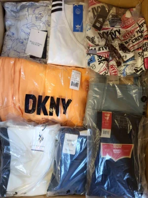 The photo shows a package with clothing in the category A.