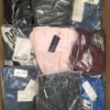 The photo shows a package with clothing in the category AP.
