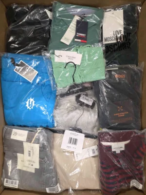 The photo shows a package with clothing in the category AP.
