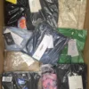 The photo shows a package with clothing in the category AP.