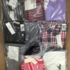The photo shows a package with clothing in the category AP.