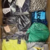 The photo shows a package with clothing in the category AP.