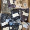 The photo shows a package with clothing in the category YA.