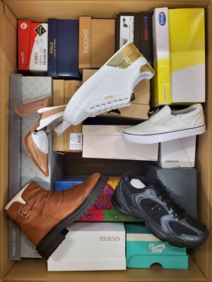 The photo shows a package with footwear in the category AS.