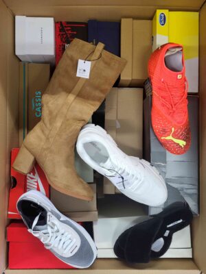 The photo shows a package with footwear in the category AS.