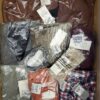The photo shows a package with clothing in the category YA.