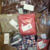 The photo shows a package with clothing in the category YA.