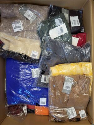 The photo shows a package with clothing in the category YA.