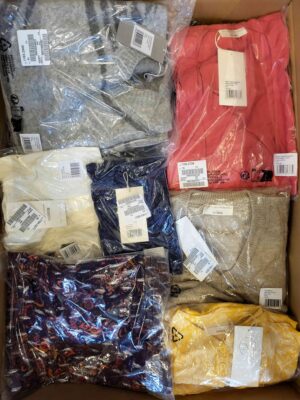 The photo shows a package with clothing in the category YA.
