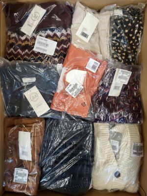 The photo shows a package with clothing in the category YA.