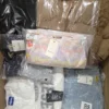 The photo shows a package with clothing in the category B.