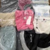 The photo shows a package with clothing in the category D.