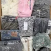 The photo shows a package with clothing in the category D.