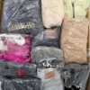 The photo shows a package with clothing in the category D.
