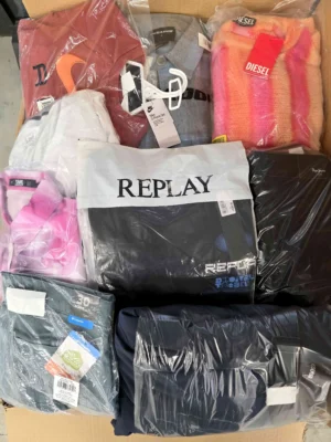 The photo shows a package with clothing in the category B.