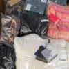 The photo shows a package with clothing in the category B.
