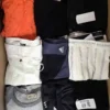The photo shows a package with clothing in the category U.
