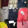 The photo shows a package with clothing in the category U.