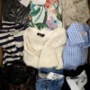 The photo shows a package with clothing in the category U.