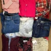The photo shows a package with clothing in the category U.