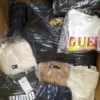 The photo shows a package with clothing in the category C.