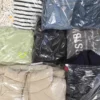 The photo shows a package with clothing in the category C.