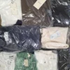 The photo shows a package with clothing in the category C.