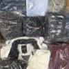 The photo shows a package with clothing in the category C.
