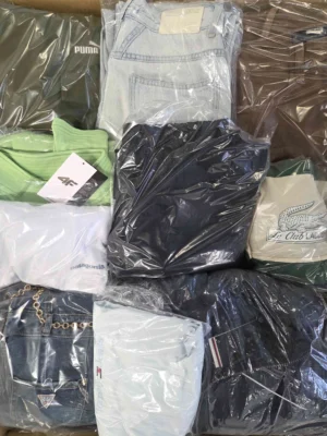 The photo shows a package with clothing in the category C.