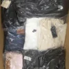 The photo shows a package with clothing in the category C.