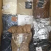 The photo shows a package with clothing in the category C.