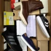The photo shows a package with footwear in the category BS.