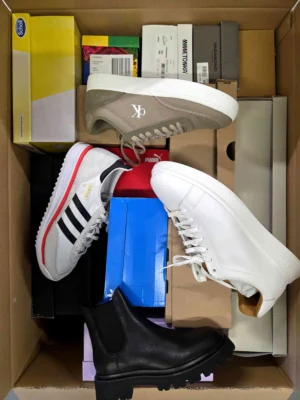 The photo shows a package with footwear in the category BS.