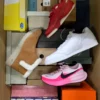The photo shows a package with footwear in the category BS.