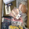 The photo shows a package with clothing in the category AU.