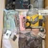 The photo shows a package with clothing in the category AU.