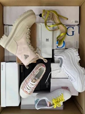 The photo shows a package with footwear in the category BS.