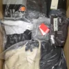 The photo shows a package with clothing in the category AM.