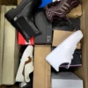 The photo shows a package with footwear in the category CS.