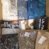 The photo shows a package with clothing in the category AM.