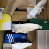 The photo shows a package with footwear in the category CS.
