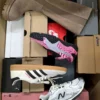 The photo shows a package with footwear in the category CS.
