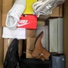 The photo shows a package with footwear in the category CS.