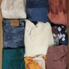The photo shows a package with clothing in the category TSC.