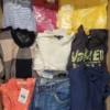 The photo shows a package with clothing in the category TSC.