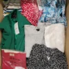 The photo shows a package with clothing in the category TSC.