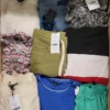 The photo shows a package with clothing in the category TSC.