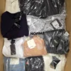 The photo shows a package with clothing in the category AP.